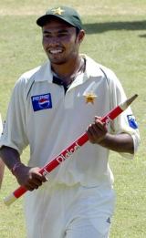 Danish Kaneria is all smiles after starring in Pakistan's comprehensive win in Jamaica &copy; AFP