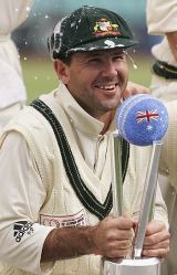 Ricky Ponting  poses with the trophy after Australia thrashed the World XI by 210 runs in the Super Test at Sydney &copy; Getty Images