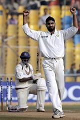 Harbhajan Singh celebrates after bowling out Muttiah Muralitharan on the final day &copy; AFP