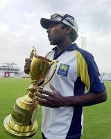 Mahela Jayawardene poses with the trophy as Sri Lanka took the series 2-0 against Bangladesh &copy; AFP
