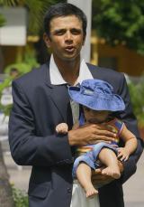 Rahul Dravid poses with his son Samit after India clinched a rare series win outside the subcontinent, in West Indies &copy; Getty Images