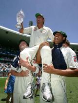 Michael Clarke and Andrew Symonds chair Shane Warne off the SCG after Australia completed their series whitewash &copy; Getty Images