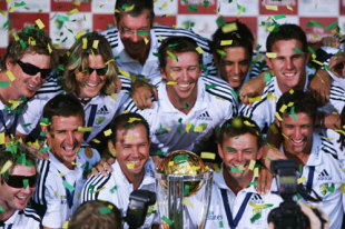 The Australian squad with the trophy during a welcome home reception in Sydney &copy; Getty Images