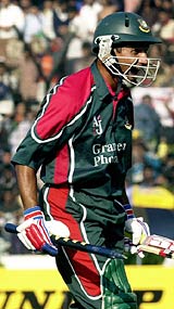Habibul Bashar celebrates Bangladesh's win in the fifth and deciding ODI against Zimbabwe. Bangladesh came back from 0-2 down in the series &copy; AFP