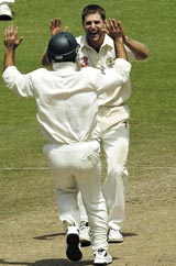 Simon Katich celebrates as Australia close in on victory in the second Test at Sydney &copy; Getty Images